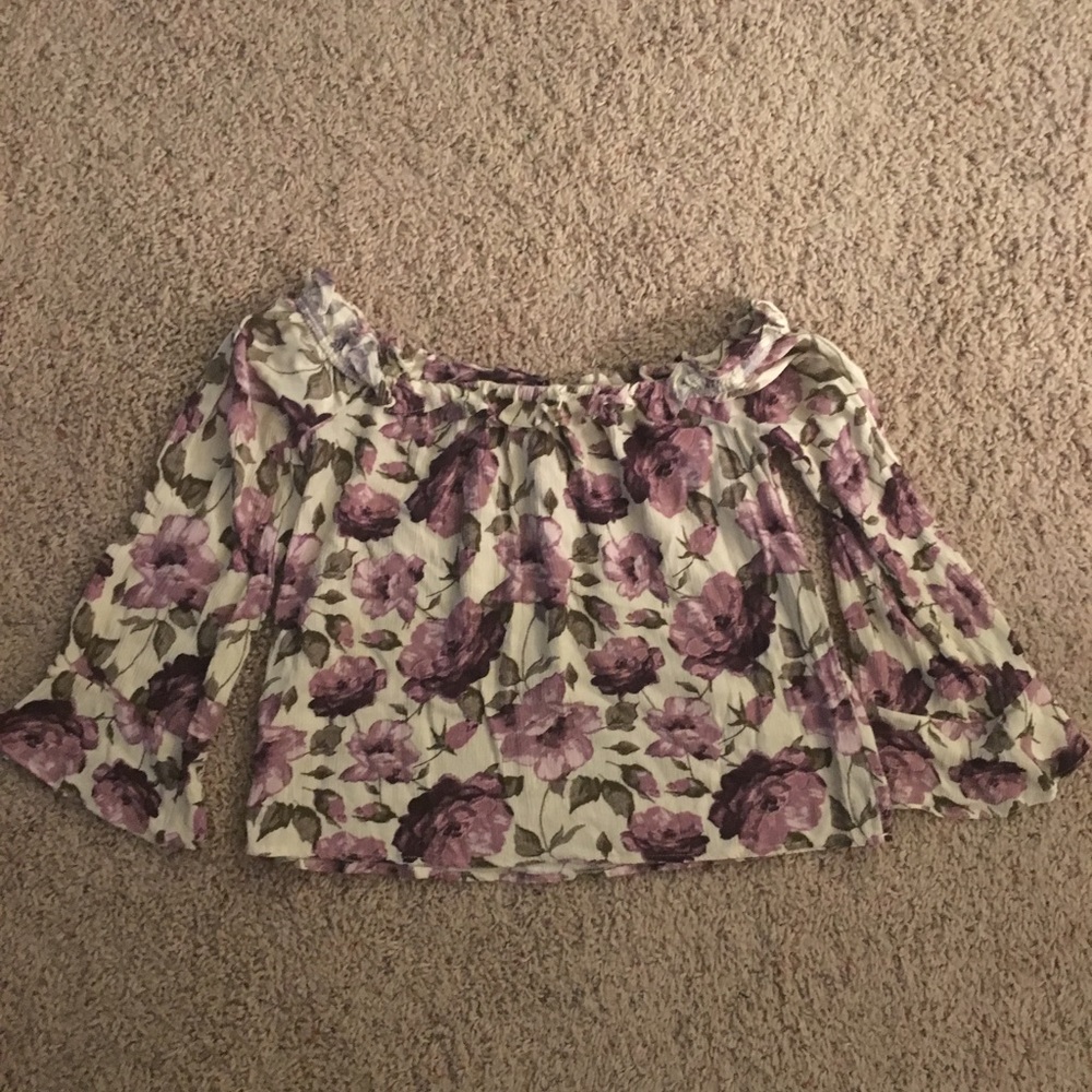Off the shoulder ruffle bell sleeve shirt.